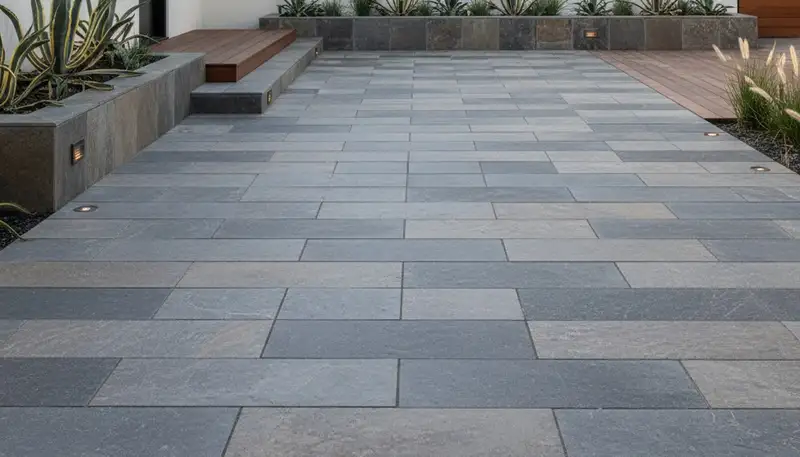 Large format stone slab installation by Chop Chop Landscaping in Long Beach, CA for modern patios and walkways